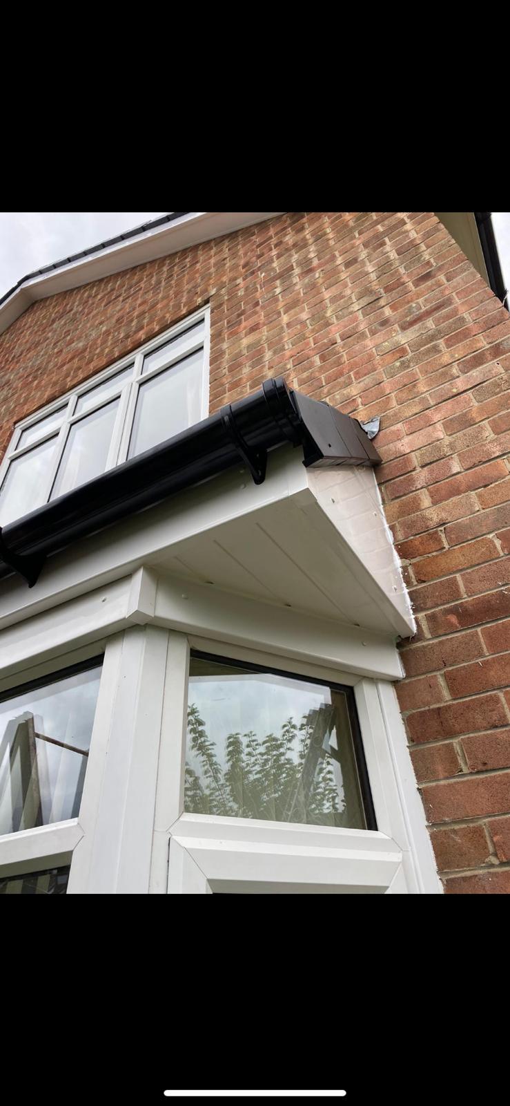 Ackroyd & Son Roofing craftsman working on a pitched roof installation